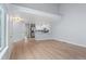 Open concept kitchen with white cabinets and stainless steel appliances at 12525 E Tennessee Cir # E, Aurora, CO 80012