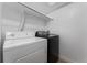 Laundry closet with washer and dryer included at 12525 E Tennessee Cir # E, Aurora, CO 80012