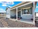 Covered backyard patio with seating, perfect for outdoor relaxation and entertaining at 1982 Peralta Loop, Castle Rock, CO 80104