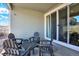 Enjoy outdoor lounging on this shaded patio with sleek gray seating arrangement at 1982 Peralta Loop, Castle Rock, CO 80104