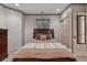 Bedroom with floral accents and wallpaper trim, plus a comfy bed with decorative pillows at 5 Tamarade Dr, Littleton, CO 80127