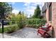 Charming backyard patio with lush greenery, a garden, and comfortable seating area perfect for relaxation at 2589 Arapahoe St, Denver, CO 80205