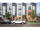 Contemporary townhouse exterior featuring modern design, mixed materials, and well-maintained landscaping at 2589 Arapahoe St, Denver, CO 80205