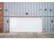 Attached garage with white door at 2589 Arapahoe St, Denver, CO 80205