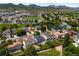 Inviting neighborhood featuring well-maintained homes, mature trees, and stunning mountain views at 5750 S Youngfield St, Littleton, CO 80127