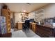 Basement office space includes a desk, shelving, and ample storage for organized and functional workspace at 5750 S Youngfield St, Littleton, CO 80127