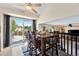Dining area with a view of the backyard and an open layout towards the living room and kitchen at 5750 S Youngfield St, Littleton, CO 80127
