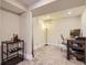 Finished basement area with both an office space and a lounge area at 345 S Forest St, Denver, CO 80246