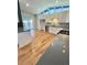 Modern kitchen featuring stainless steel appliances, gray countertops, and white cabinetry at 345 S Forest St, Denver, CO 80246