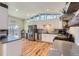 Bright kitchen featuring stainless steel appliances, ample counter space, and modern white cabinets at 345 S Forest St, Denver, CO 80246