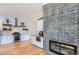 Contemporary kitchen featuring stainless steel appliances and fireplace wall at 345 S Forest St, Denver, CO 80246