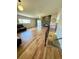 Spacious living room featuring hardwood floors, fireplace, and a staircase to the lower level at 345 S Forest St, Denver, CO 80246
