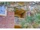 Charming balcony with string lights offers a cozy outdoor space for relaxation and enjoyment of the scenery at 1671 W Canal Cir # 221, Littleton, CO 80120
