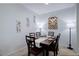 Dining room featuring modern decor, a stylish table setting, and wood accents at 1671 W Canal Cir # 221, Littleton, CO 80120