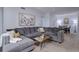 Comfortable living room featuring a large sectional couch and decor at 1671 W Canal Cir # 221, Littleton, CO 80120