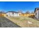Generous backyard with secure fencing, providing plenty of space for outdoor activities and entertainment at 1328 Holly St, Denver, CO 80220