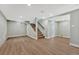 Spacious finished basement featuring durable flooring and a staircase to the main level, offering versatile living space at 1328 Holly St, Denver, CO 80220