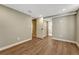 Cozy finished bedroom featuring neutral colors and durable flooring for adaptable living, ready to be personalized at 1328 Holly St, Denver, CO 80220