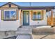 A charming front porch showcases updated features and architectural details at 1328 Holly St, Denver, CO 80220
