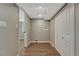 Convenient laundry area with ample closet space and modern connections, designed for efficient home management at 1328 Holly St, Denver, CO 80220
