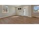 Bright and airy living room featuring modern floors and ample natural light at 1328 Holly St, Denver, CO 80220