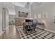 Office area with soaring ceilings, a black and white rug, and lots of natural light at 1192 S Fultondale Cir, Aurora, CO 80018