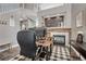 Office area with soaring ceilings, a black and white rug, and lots of natural light at 1192 S Fultondale Cir, Aurora, CO 80018