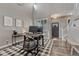 Office area with soaring ceilings, a black and white rug, and lots of natural light at 1192 S Fultondale Cir, Aurora, CO 80018