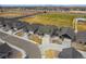 Aerial view of homes featuring landscaped yards, driveways, and street access at 331 Josef Cir, Fort Lupton, CO 80621