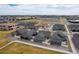 Aerial view of new residential construction homes with easy access to roadways at 331 Josef Cir, Fort Lupton, CO 80621