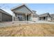 Charming home with a two-car garage, covered porch, and inviting curb appeal at 331 Josef Cir, Fort Lupton, CO 80621
