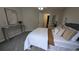 Inviting bedroom with neutral tones and a well-made bed at 13854 E Lehigh Ave # D, Aurora, CO 80014