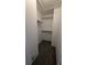 Walk-in closet with shelving and carpeting at 13854 E Lehigh Ave # D, Aurora, CO 80014