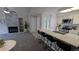 Open floor plan with fireplace and kitchen at 13854 E Lehigh Ave # D, Aurora, CO 80014