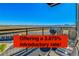 Enjoy beautiful views from this spacious balcony with plenty of room for outdoor dining and relaxation at 13598 Via Varra # 301, Broomfield, CO 80020