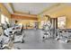 Modern community gym featuring multiple machines and mirrors at 13598 Via Varra # 301, Broomfield, CO 80020
