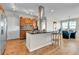 Modern kitchen featuring stainless steel appliances, granite countertops, and a functional island at 13598 Via Varra # 301, Broomfield, CO 80020