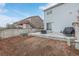 Grassy backyard with a concrete patio area, perfect for outdoor activities and relaxation at 649 Mockingbird St, Brighton, CO 80601