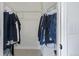 Organized walk-in closet featuring wire shelving, rods, and ample storage space for clothes and accessories at 649 Mockingbird St, Brighton, CO 80601