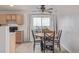 Cozy dining area features natural lighting and neutral decor at 649 Mockingbird St, Brighton, CO 80601