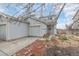 Charming home features a one-car garage, well-maintained front yard with shrubs, and a welcoming entrance at 649 Mockingbird St, Brighton, CO 80601