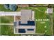 Aerial view of property featuring solar panels, RV parking, and a spacious 6,120 sqft lot at 4701 E Jewell Ave, Denver, CO 80222
