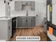 Remodeled kitchen showcasing new appliances, updated cabinets, sleek countertops, and hardwood flooring at 4701 E Jewell Ave, Denver, CO 80222