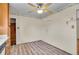 Bright kitchen area features retro details, a ceiling fan, and ample counter space, perfect for meal preparation at 5510 Troy St, Denver, CO 80239