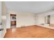 Open living room features hardwood floors, natural light, and an inviting space for relaxation and entertainment at 5510 Troy St, Denver, CO 80239
