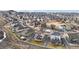 A neighborhood aerial view of a well-planned neighborhood with various home styles and community amenities at 2042 Shadow Creek Dr, Castle Rock, CO 80104