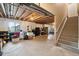 Unfinished basement space with exposed ceiling, stairs, and potential for customization at 2042 Shadow Creek Dr, Castle Rock, CO 80104