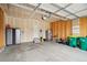 Spacious two-car garage featuring ample storage space and a work area, perfect for projects at 2042 Shadow Creek Dr, Castle Rock, CO 80104