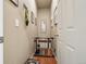 Functional mud room with dog crate, storage hooks, and ample space for pet accessories at 2042 Shadow Creek Dr, Castle Rock, CO 80104