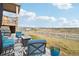 Serene patio offering stunning views of the surrounding landscape, a perfect spot for relaxation at 2042 Shadow Creek Dr, Castle Rock, CO 80104